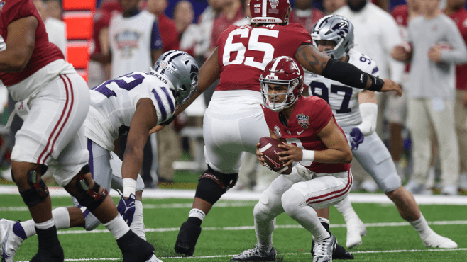 Kansas State linebacker Daniel Green (22) moves in against Alabama quarterback Bryce Young (9) during the first half of the 2022 Sugar Bowl at Caesars Superdome on Saturday. -- Photo by Stephen Lew-USA TODAY Sports / Reuters 