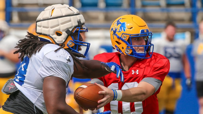 McNeese running back Josh Parkers receives a handoff from quarterback Walker Wood during the team's spring game earlier this year. -- Photo courtesy of McNeese Athletics