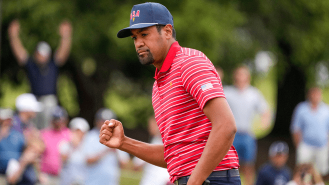 Team USA golfer Tony Finau celebrates making his putt on the first green during the singles match play of the Presidents Cup golf tournament at Quail Hollow Club. -- Photo courtesy of Jim Dedmon-USA TODAY Sports / Reuters